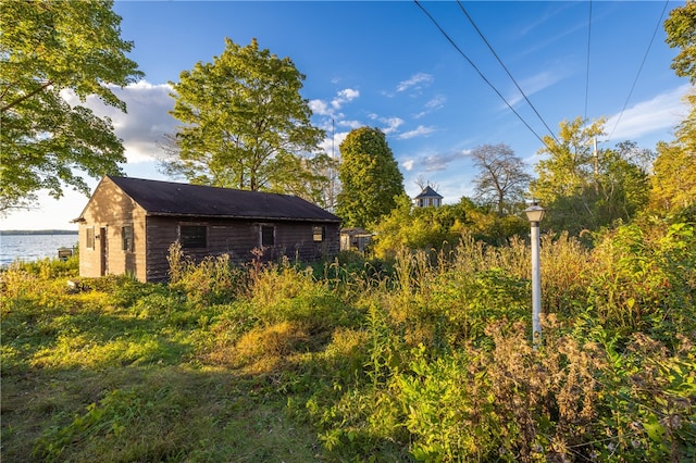 view of side of property with a water view