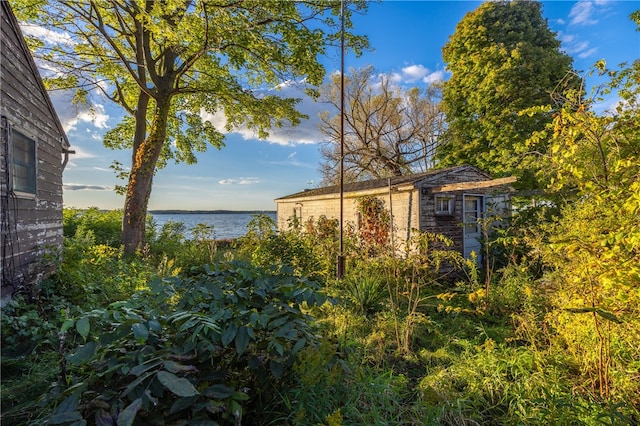 exterior space with a water view