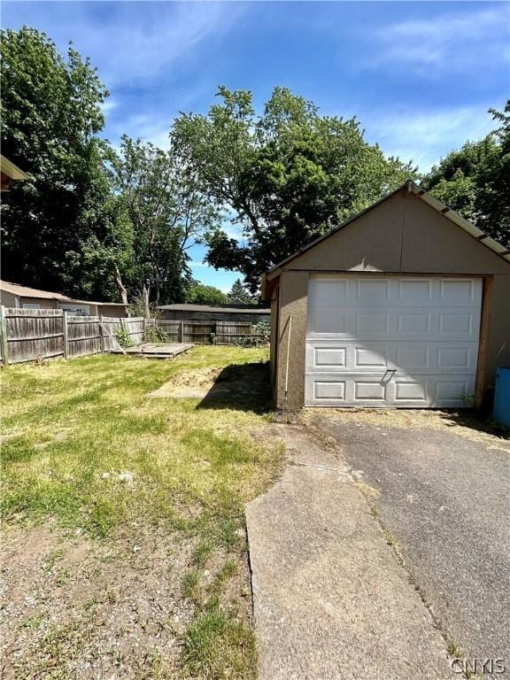 919 Lenox Ave, Utica, NY 13502 - detached garage with fence and driveway