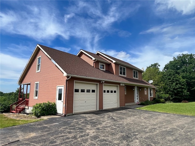 view of front of house with a garage