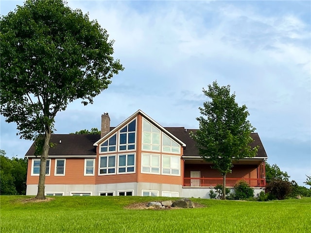 1234 Overhiser Rd, Hanover, NY 14062 - back of property with a chimney and a lawn