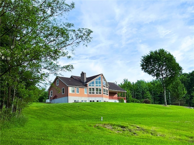 1234 Overhiser Rd, Hanover, NY 14062 - back of property featuring a chimney and a lawn