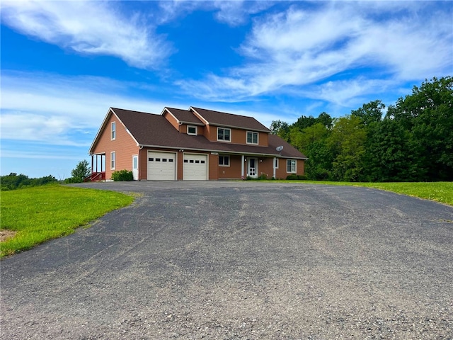 1234 Overhiser Rd, Hanover, NY 14062 - view of front of house with an attached garage and asphalt driveway