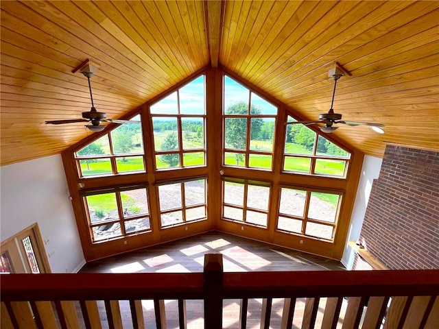 unfurnished living room featuring wooden ceiling and lofted ceiling