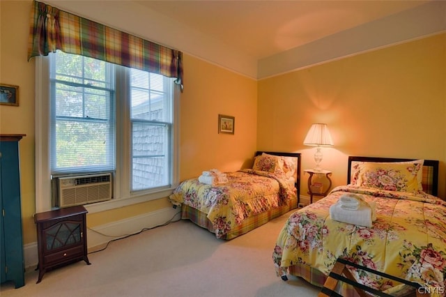 bedroom featuring carpet and cooling unit