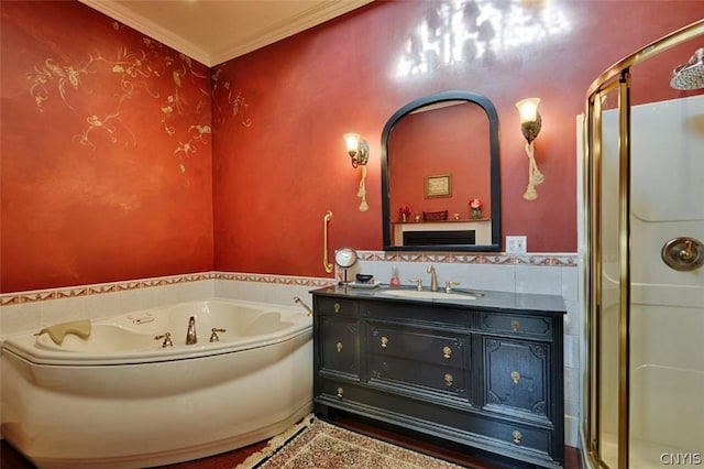 bathroom featuring ornamental molding, separate shower and tub, and vanity