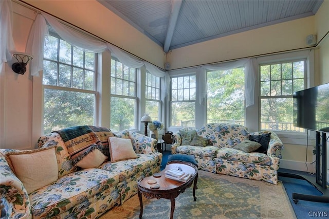 sunroom featuring wooden ceiling and beamed ceiling