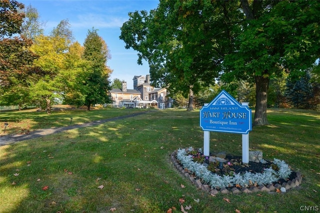 surrounding community featuring a lawn