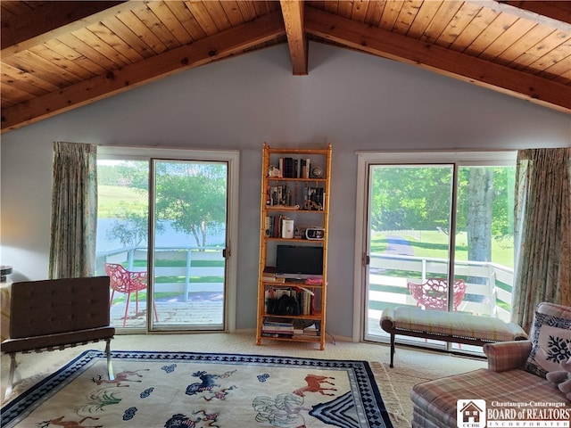 unfurnished living room with vaulted ceiling with beams, wooden ceiling, and carpet floors