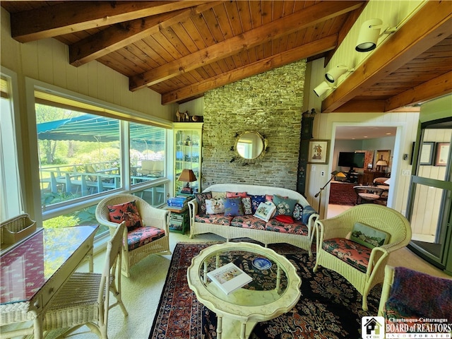 living room featuring carpet flooring, wood ceiling, and vaulted ceiling with beams