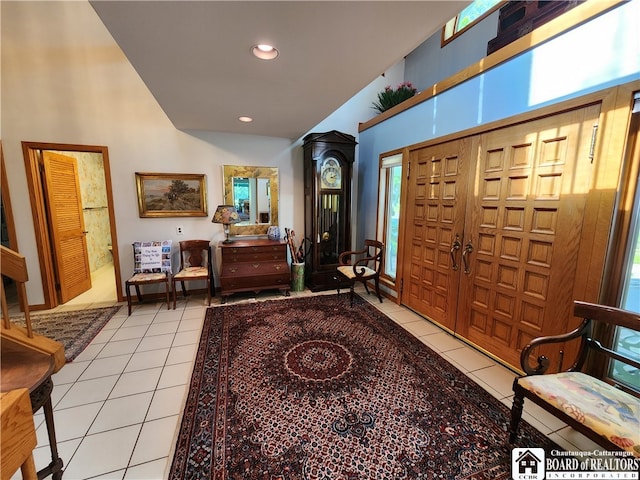 tiled foyer featuring a wealth of natural light