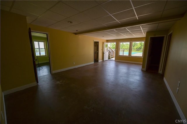 spare room featuring a paneled ceiling