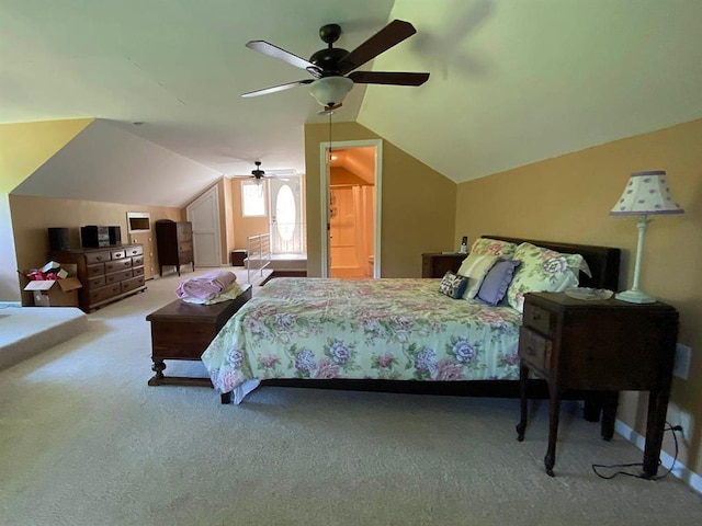 bedroom with carpet, ceiling fan, and vaulted ceiling