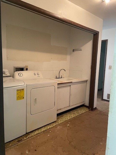 laundry room featuring independent washer and dryer and sink