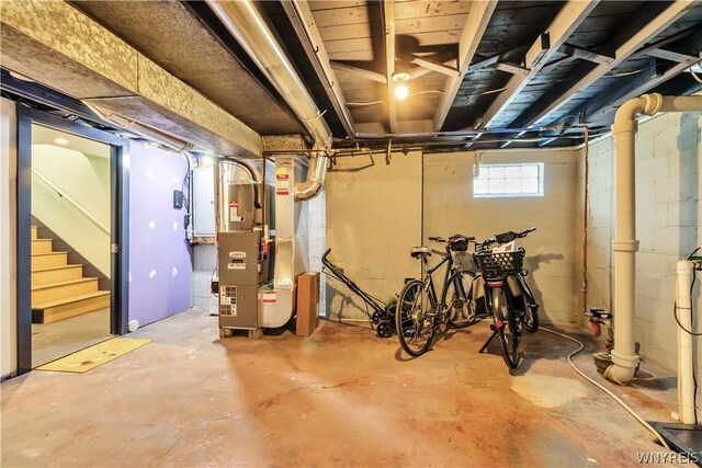 basement featuring heating unit