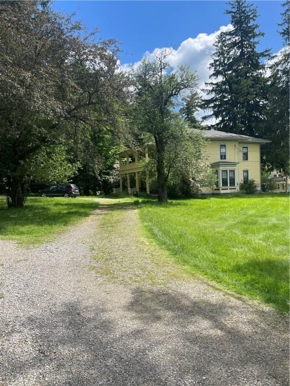 view of road with driveway