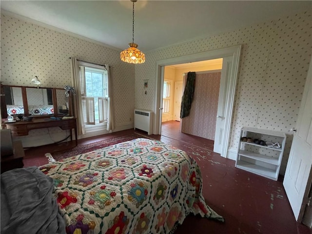 bedroom featuring radiator, dark wood-type flooring, and wallpapered walls