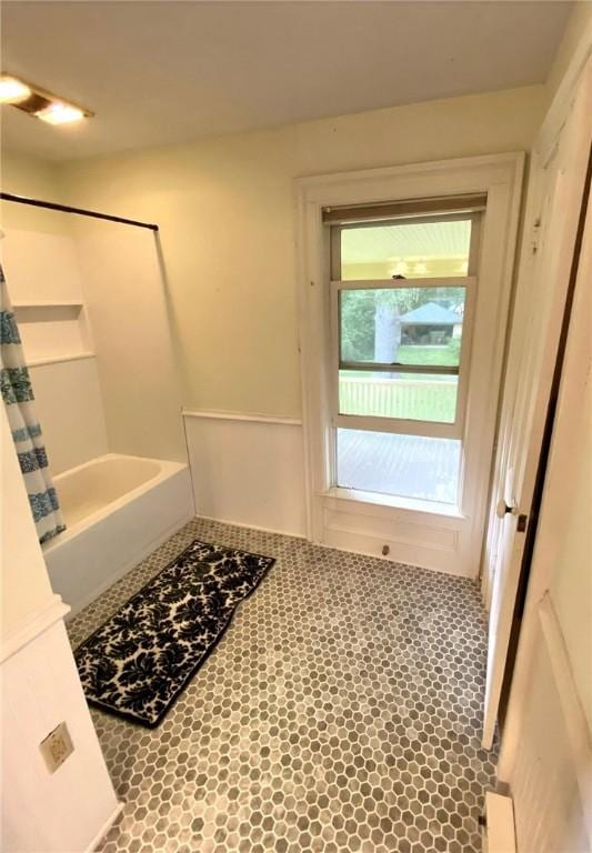 full bath featuring shower / bathtub combination with curtain