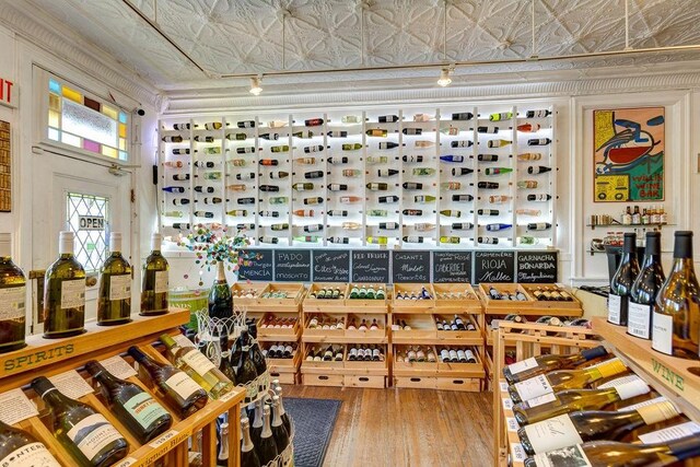 wine cellar featuring hardwood / wood-style floors