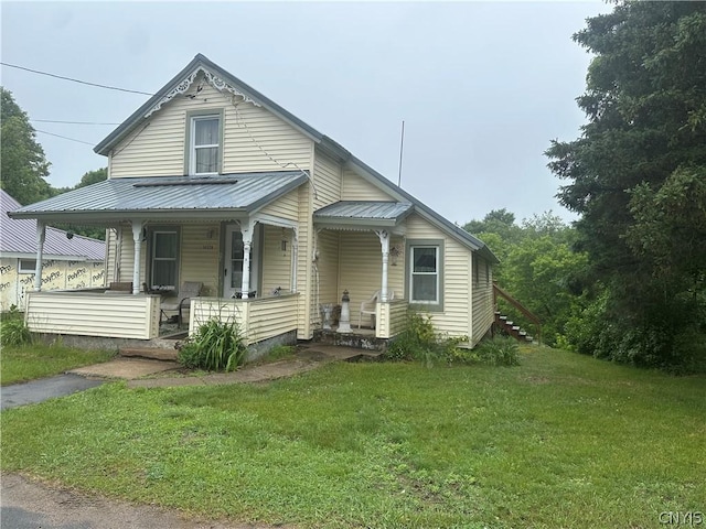 view of front of house featuring a porch and a front lawn