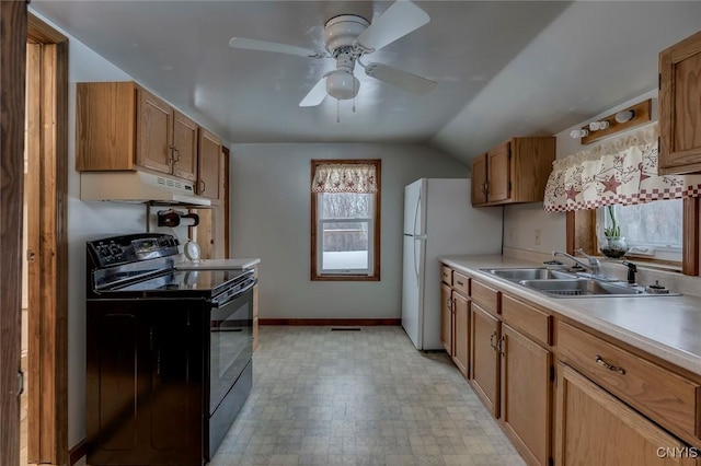 kitchen featuring vaulted ceiling, black electric range oven, sink, and ceiling fan