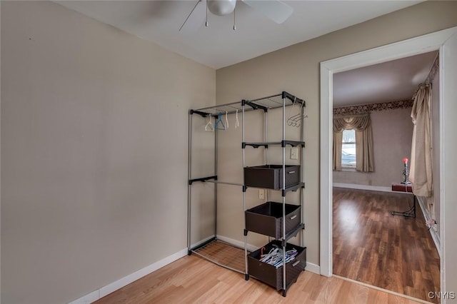 interior space with hardwood / wood-style flooring and ceiling fan