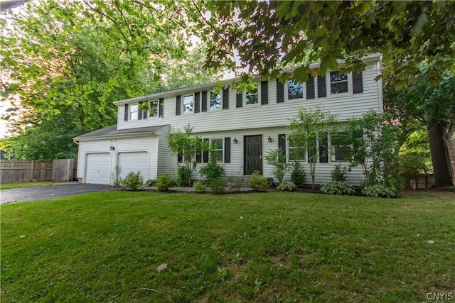 colonial-style house with a front yard