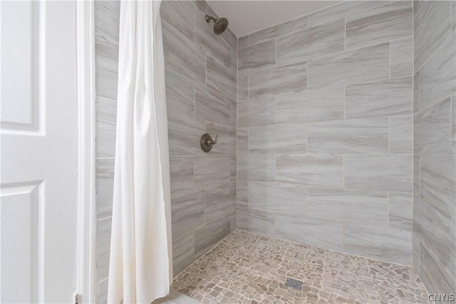 bathroom featuring walk in shower