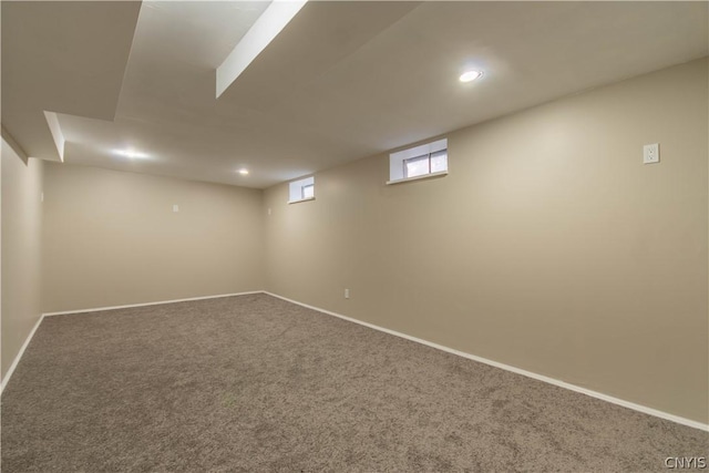 basement featuring carpet flooring