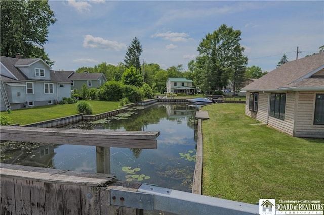 view of water feature with a dock