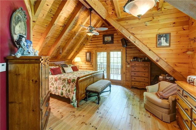 bedroom with lofted ceiling with beams, light wood-style flooring, wood ceiling, access to outside, and wood walls