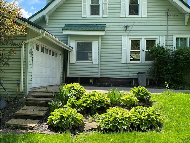 exterior space featuring a garage