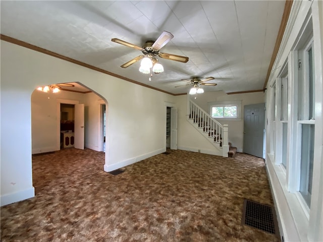 unfurnished living room with ceiling fan and carpet floors