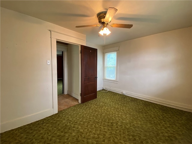 unfurnished bedroom featuring ceiling fan and carpet floors