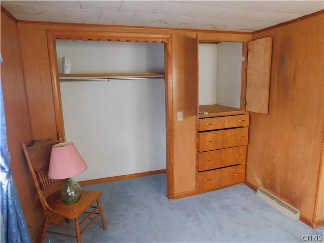 closet featuring a baseboard heating unit