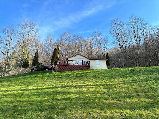 view of yard featuring a wooden deck