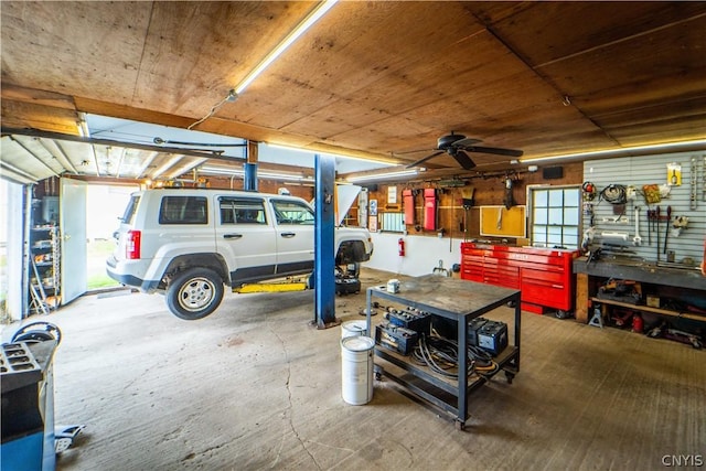 6338 State Route 167, Manheim, NY 13329 - garage featuring a workshop area, ceiling fan, and wood ceiling