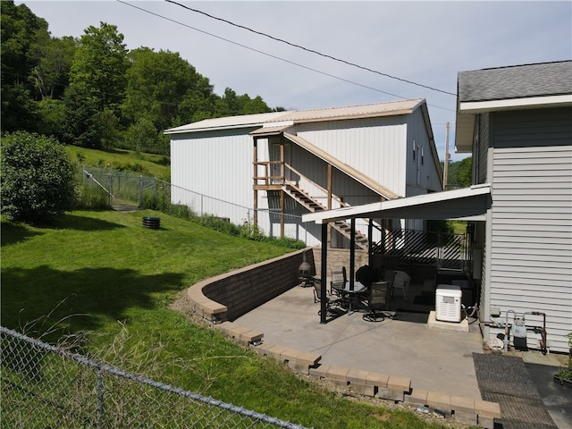 exterior space featuring a yard and a patio area