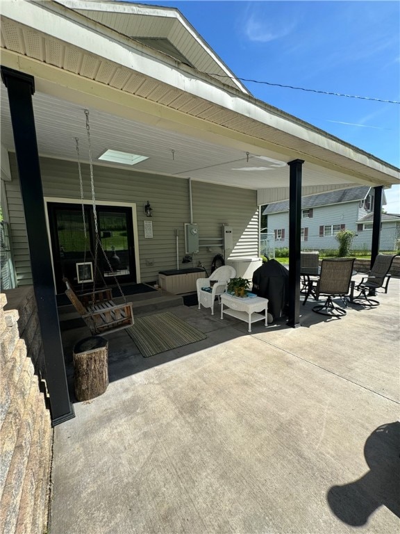 view of patio with a grill