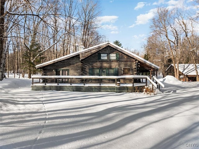 view of log cabin