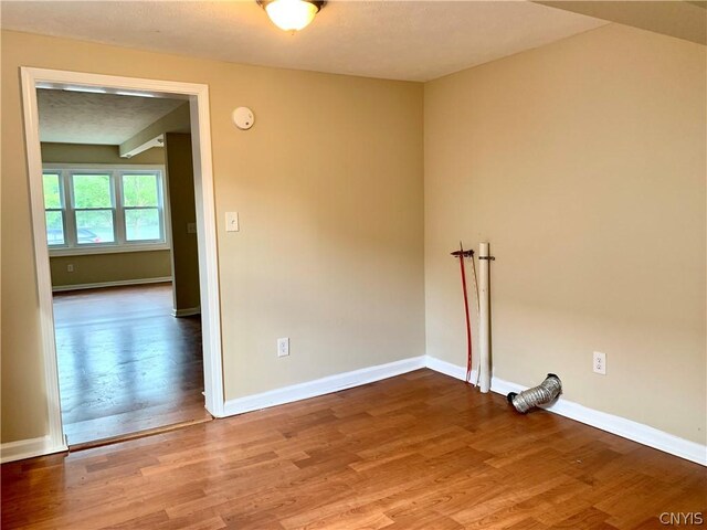 2739 State Route 48, Minetto, NY 13115 - spare room with wood finished floors and a smoke detector