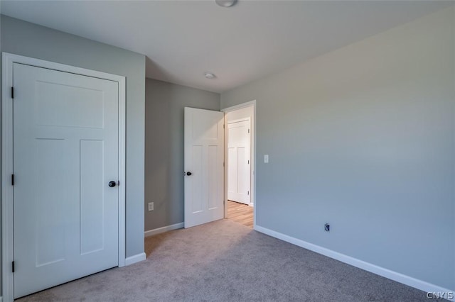 22218 Freedom Dr, Champion, NY 13619 - unfurnished bedroom with carpet and baseboards