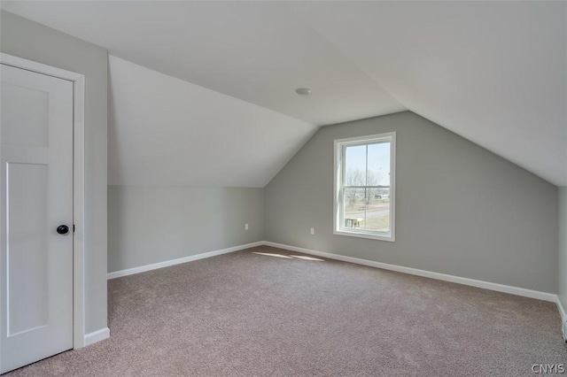 22218 Freedom Dr, Champion, NY 13619 - bonus room with carpet floors, lofted ceiling, and baseboards