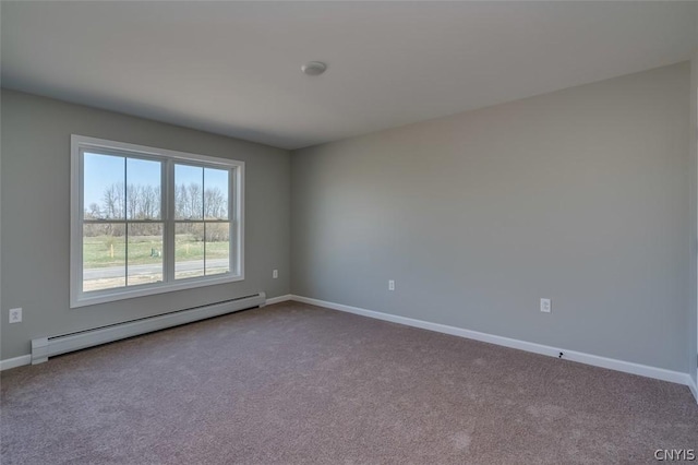 22218 Freedom Dr, Champion, NY 13619 - carpeted empty room featuring baseboards and baseboard heating