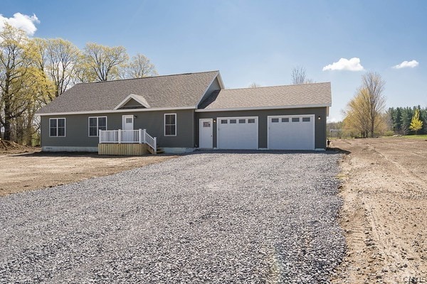 single story home with a garage