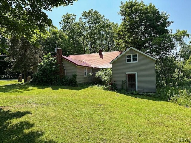 exterior space with a yard