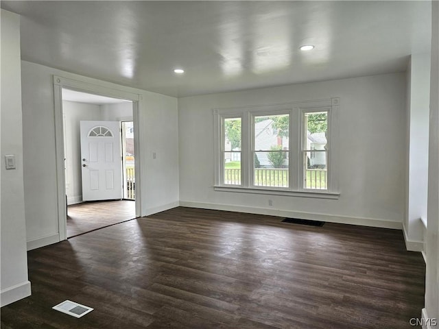 interior space featuring dark hardwood / wood-style flooring