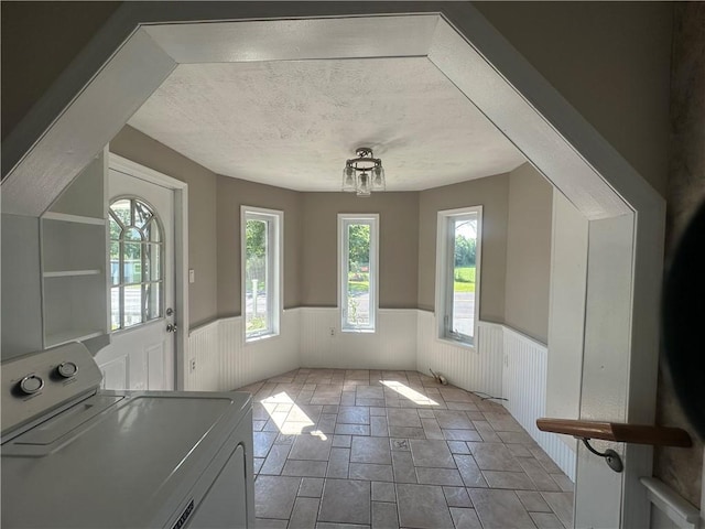 interior space with washer / clothes dryer