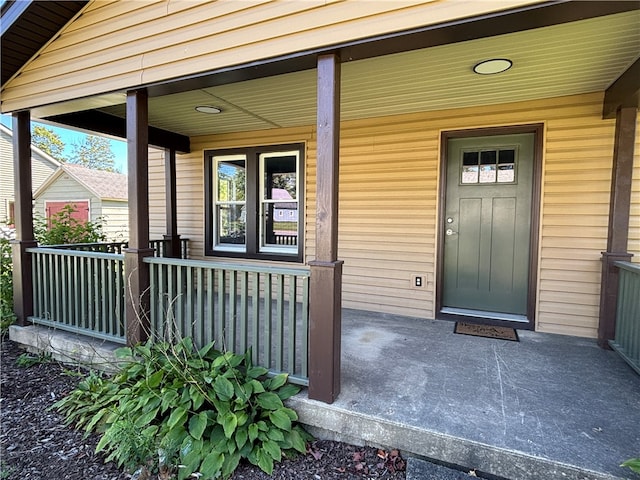 property entrance featuring covered porch