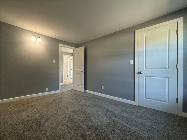 empty room with carpet flooring